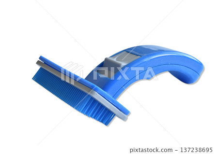 Blue slicker brush for combing out pet hair. 137238695