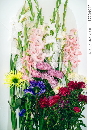 Floral arrangement highlighting importance of biodiversity and support for small scale local flower farming practices. sustainable gardening, local blooms, slow flower movement, Floral arrangement highlighting importance of biodiversity and support for small scale local flower farming practices. sustainable gardening, local blooms, slow flower movement, 137239045