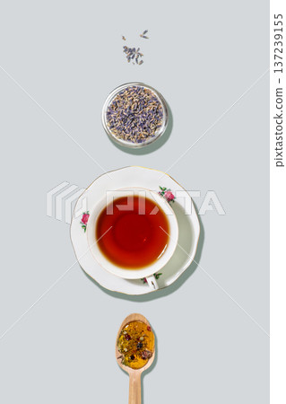 Herbal Tea Cup With Dried Lavender And Honey Spoon Herbal Tea Cup With Dried Lavender And Honey Spoon 137239155
