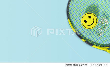 Tennis Racket With Smiley Face Sticker Over Blue Background 137239165