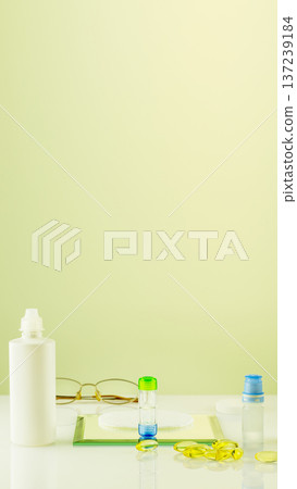 Eye Care Kit With Contact Lenses, Drops And Vitamins On Pastel Green Background Eye Care Kit With Contact Lenses, Drops And Vitamins On Pastel Green Background 137239184