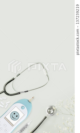 Blood Glucose Meter With Insulin Pen And Stethoscope On Light Background Blood Glucose Meter With Insulin Pen And Stethoscope On Light Background 137239219