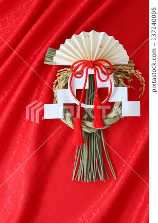 Shimenawa decoration, New Year's lucky charm [red background, simple, copy space] 137240008
