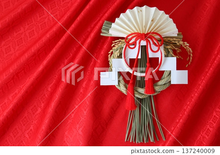 Shimenawa decoration, New Year's lucky charm [red background, simple, copy space] 137240009