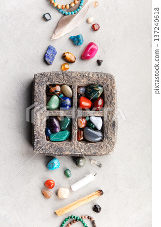 Colorful Healing Crystals with Spiritual Tools on Neutral Surface Colorful Healing Crystals with Spiritual Tools on Neutral Surface 137240618