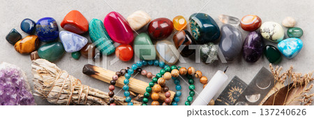 Healing Crystals, Tarot Cards, and Candle on Spiritual Altar Healing Crystals, Tarot Cards, and Candle on Spiritual Altar 137240626
