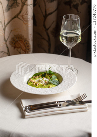 Spinach cream mousse with burrata and pine nuts Spinach cream mousse with burrata and pine nuts 137240770