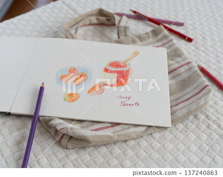 Sketchbook, colored pencils, and cloth bag Sketchbook, colored pencils, and cloth bag 137240863