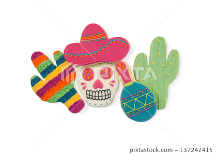 Colorful skull, cactus, and maraca cookies, isolated, PNG 137242415