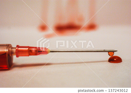 blood drop in syringe vaccine medicine 137243012