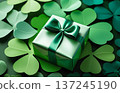Elegantly tied green present on a clover leaf cutout design background in shades of green 137245190
