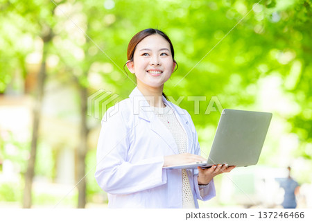 A lady in white 137246466