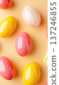Glossy Easter eggs arranged on pastel background for festive decoration Close up Top view 137246855