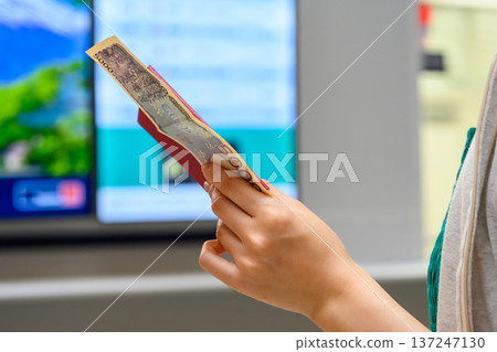 Passport and Japanese yen ■Photography cooperation: Kansai International Airport (KIX) Passport and Japanese yen ■Photography cooperation: Kansai International Airport (KIX) 137247130