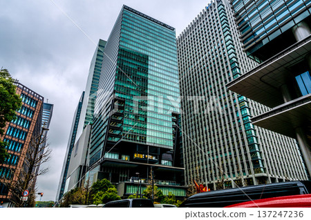 Dark clouds over the Tokyo cityscape in Japan... Japan's economy is depressed... Otemachi is in the rain... = March 3, 2026 137247236