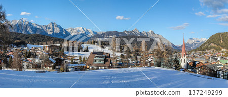 Winter panorama of Seefeld village with the church at sunset in in the Tyrolean Alps, Austria Winter panorama of Seefeld village with the church at sunset in in the Tyrolean Alps, Austria 137249299