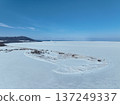 Aerial photo of Lake Saroma and Cape Kimuaneppu snow fields in winter 137249337