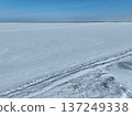 Aerial photo of Lake Saroma and Cape Kimuaneppu snow fields in winter 137249338