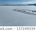 Aerial photo of Lake Saroma and Cape Kimuaneppu snow fields in winter 137249339