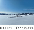 Aerial photo of Lake Saroma and Cape Kimuaneppu snow fields in winter 137249344