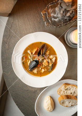 Marseille seafood soup with bread and butter Marseille seafood soup with bread and butter 137251662