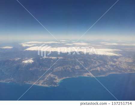 View of an island in the ocean from above View of an island in the ocean from above 137251754