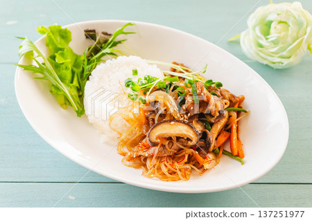 Rice topped with japchae 137251977