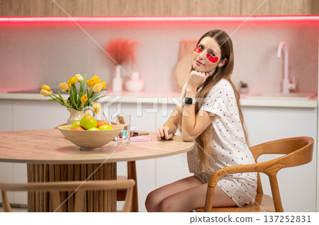 Pretty long-haired woman having beauty procedures and using eye patches 137252831