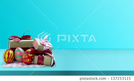 Vibrant hand-painted Easter eggs and small gift boxes wrapped with ribbons arranged on a blue surface. Minimalist composition with plain turquoise background and large copy space for festive messages Vibrant hand-painted Easter eggs and small gift boxes wrapped with ribbons arranged on a blue surface. Minimalist composition with plain turquoise background and large copy space for festive messages 137253115