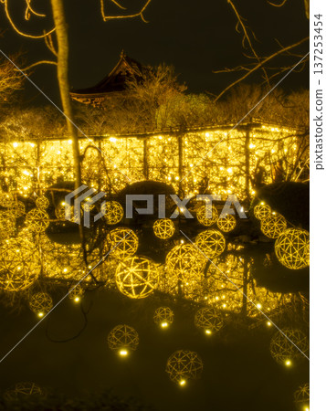 Mysterious night view of a bamboo ball and temple floating in the darkness Mysterious night view of a bamboo ball and temple floating in the darkness 137253454
