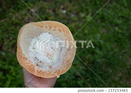 Traditional egg hopper Sri Lankan street food top view 137253465