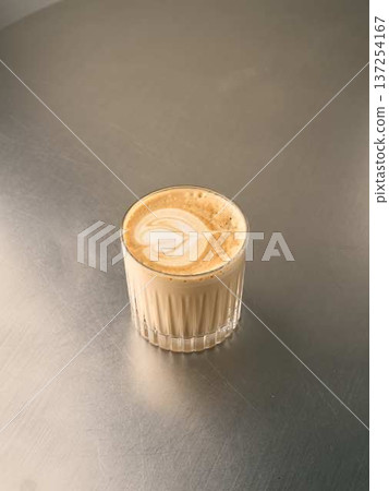 Barista crafted latte featuring detailed heartshaped foam art Barista crafted latte featuring detailed heartshaped foam art 137254167