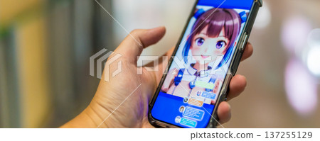 Watching VTubers on a smartphone 137255129