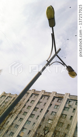 The Architecture backgrounds and objects. Street lamp. Sky. Birds. The Architecture backgrounds and objects. Street lamp. Sky. Birds. 137257025