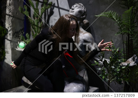 Actor passionately communicates through expressive gestures and stance Actor passionately communicates through expressive gestures and stance 137257809