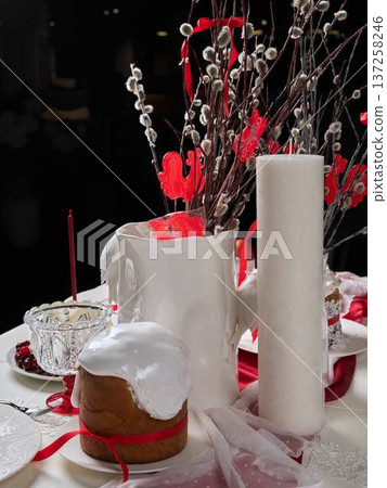 Chic display featuring willow branches and festive accents 137258246