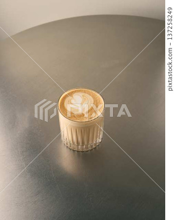 Relaxed atmosphere highlighting single coffee with soft illumination Relaxed atmosphere highlighting single coffee with soft illumination 137258249