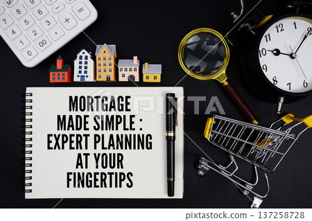 Notepad with the phrase "Mortgage Made Simple: Expert Planning at Your Fingertips" surrounded by a pen, calculator, magnifying glass, clock, mini trolley shopping cart and house model 137258728