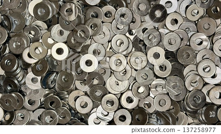 Pile of metal washers. Industrial hardware texture background. Pile of metal washers. Industrial hardware texture background. 137258977