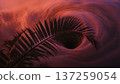 Dramatic red sky with swirling clouds behind a silhouetted palm frond, creating a surreal and tropical scene. 137259054