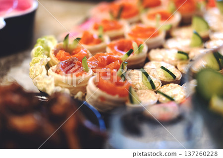 Tartlets with salmon on the festive table. High quality photo Tartlets with salmon on the festive table. High quality photo 137260228