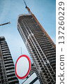 Tall modern building against blue sky. High quality photo 137260229