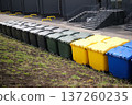 Lots of colorful plastic garbage containers. High quality photo 137260235