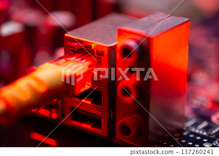 Fiber optic cables connected to optical ports and network cables connected to internet ports. High quality photo Fiber optic cables connected to optical ports and network cables connected to internet ports. High quality photo 137260241