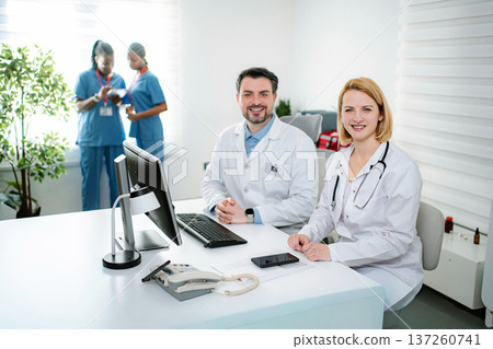 Medical professionals smiling in modern clinic office 137260741