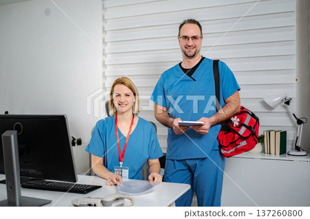 Medical team members smiling at clinic office 137260800