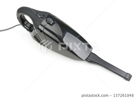 Compact Black Automotive Vacuum Cleaner with Nozzle and Cord Isolated on White Background 137261848
