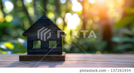 Miniature wooden house symbolizes home cleaning practice and care for living spaces in nature Miniature wooden house symbolizes home cleaning practice and care for living spaces in nature 137261934