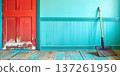 Brightly colored room with a broom against the wall in a home cleaning setting 137261950