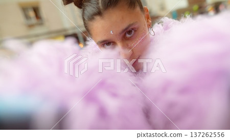 Quiet anonymous muse blending into busy city life background 137262556